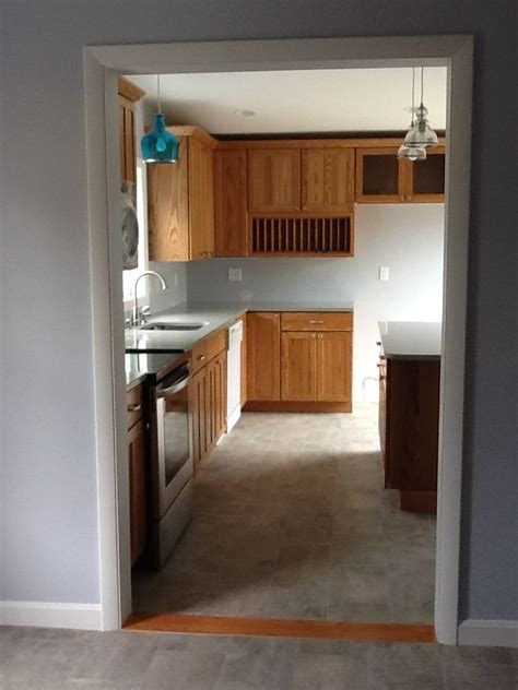 People also love these ideas. New kitchen, pendant lights, sheet vinal floor, Kraftmaid ...