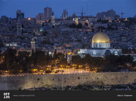 The Dome Of The Rock Against The Jerusalem Skyline At Night Stock Photo