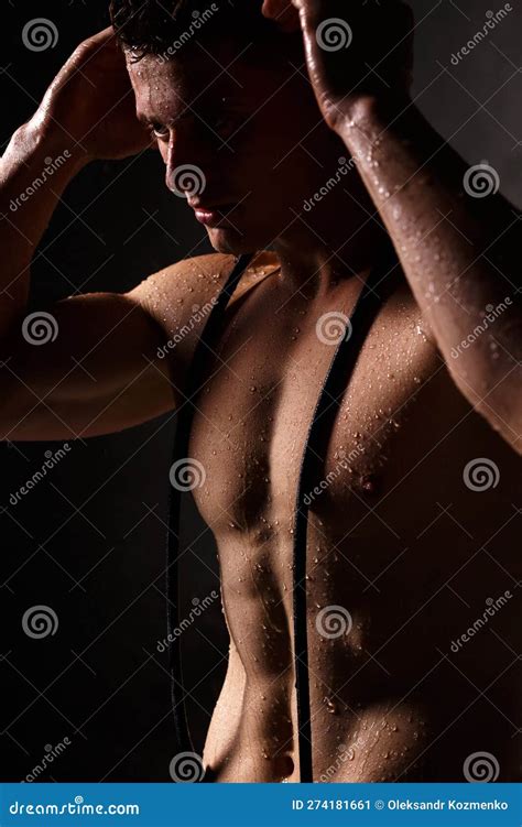 Athlete Bodybuilder Trains In The Studio In The Rain Stock Image Image Of Dark Handsome