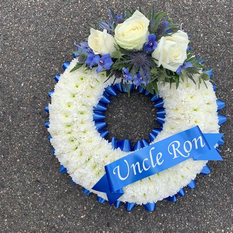 Blue And White Wreath Funeral Flowers Tribute With Personalised Ribbon