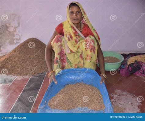 Rural Indian Women Cleaning Grain At Home Editorial Image 196101200