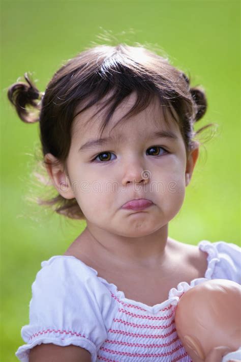 Pouting Baby Girl With Big Brown Eyes Stock Photo Image