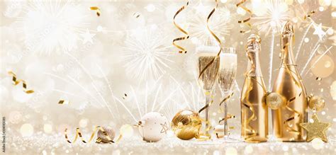 New Years Eve Celebration Background With Champagne And Confetti