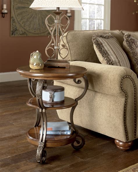 This is a great chair side table. Nestor Round Chairside End Table from Ashley (T517-7 ...