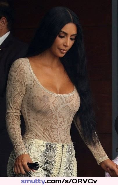 Kim Kardashian Wearing A See Through Top Outside Her Hotel