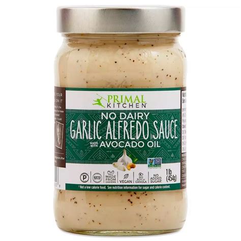 Don't be put off by the somewhat grainy texture of this sauce — it's packed with romano and parmesan, making it the add some brightness to your alfredo dish with the addition of lemon. Primal Kitchen No-Dairy Garlic Alfredo Sauce - SAUCE RANK