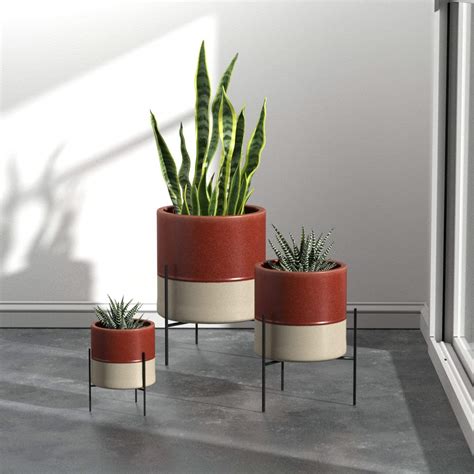 Compare prices & read reviews. Rivet Mid-Century Ceramic Planter with Stand, 17" H ...