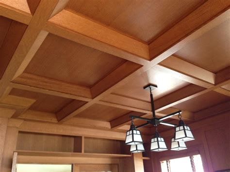 A drop ceiling is a secondary ceiling that is installed below the room's structural ceiling. Coffered Ceilings, Wood Suspended Drop Ceiling Systems