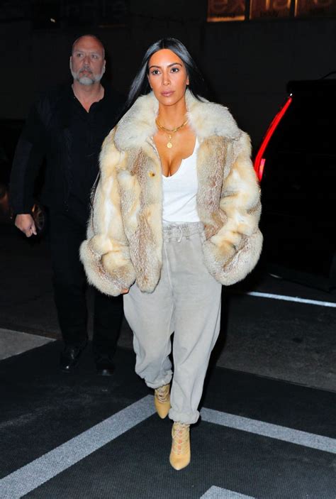 Kim Kardashian Rocks A Gucci Pantsuit Without A Top In La Kim