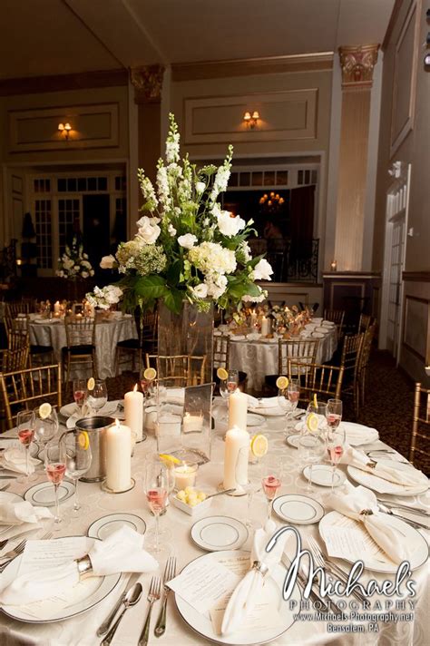 Elevated All White Centerpieces Designed By Heather Towne Flowers By