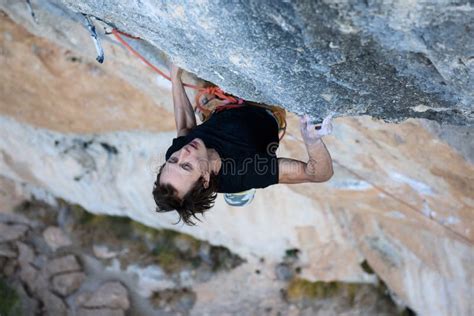 Extreme Sport Young Athletic Male Rock Climber Climbing Cliff Wall