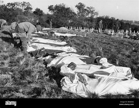 D Day Casualties American Dead In Body Bags Await Temporary Burial On