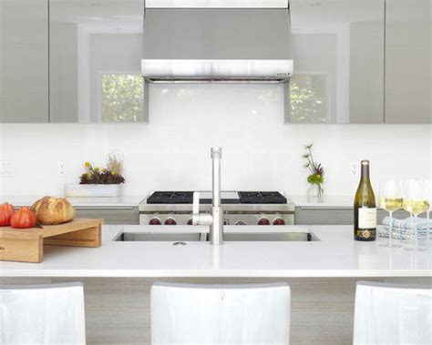 A quartz backsplash is not heat resistant, so make note of that if you are installing it in the kitchen. Quartz Backsplash Ideas, Pictures, Remodel and Decor