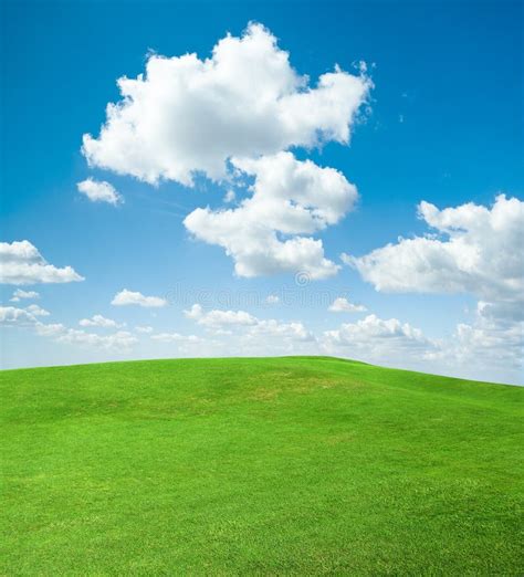 Green Grass Field And The Clouds Stock Photo Image Of Field Idyll