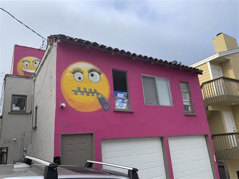 Woman Paints Giant Emojis On Her House Khabarhub