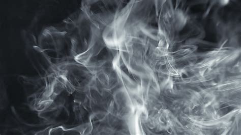 White Smoke Flows On Black Background Seamless Loop Stock Footage