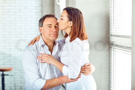 mature couple happy hugging indoors stock image colourbox