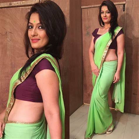 falguni rajani green saree blue saree indian tv actress tamil actress golden blouse