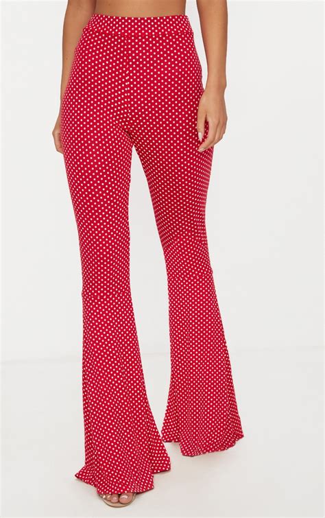 Red Polka Dot Flared Leg Trousers Trousers Prettylittlething