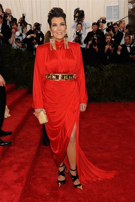 kris jenner leads the ladies in red at met gala but gets it very wrong with eighties style frock