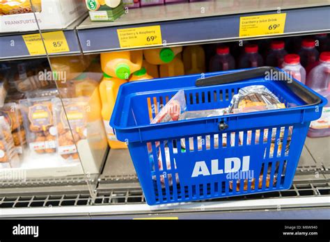 Aldi shopping basket inside a supermarket, UK Stock Photo - Alamy