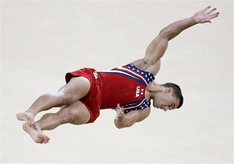 Photos Grace And Athleticism On Display As Gymnasts Go For Gold In Rio