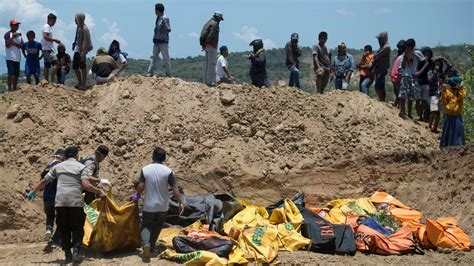 Indonesia Earthquake And Tsunami Dead Buried In Mass Grave Bbc News