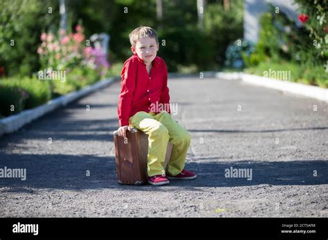 Sad Boy Suitcase Hi Res Stock Photography And Images Alamy
