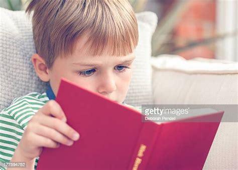 Child Reading Alone Photos And Premium High Res Pictures Getty Images