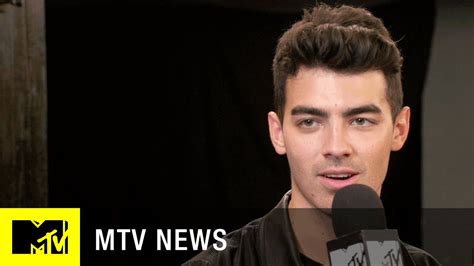 Joe jonas celebrated dnce's 'cake by the ocean' reaching a billion streams by eating a mcdonald's from his spotify plaque. Joe Jonas' New Band DNCE Explains the Meaning of 'Cake By ...