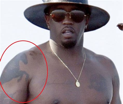 p diddy s 11 tattoos and their meanings body art guru