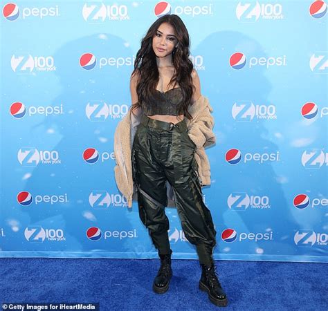 Madison Beer Flaunts Cleavage And Flat Stomach In Camo Corset At Jingle Ball In Nyc Daily Mail