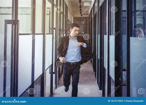 Asian Businessman Running On The Office Hallway Stock Image Image Of