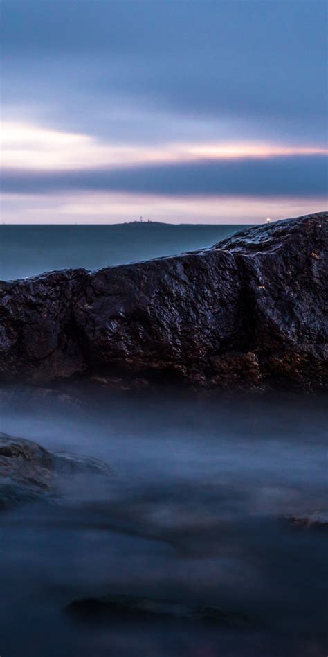 Download 1080x2160 Wallpaper Evening Mist Coast Rocks Nature Honor