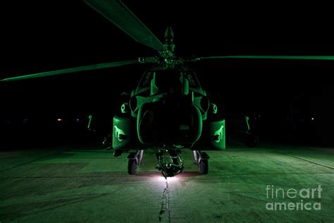 An Ah 64d Apache Helicopter At Night Photograph By Terry Moore