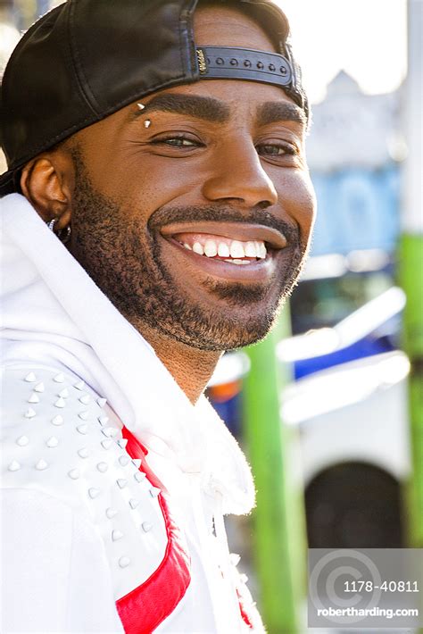 Portrait Of Smiling Black Man Stock Photo