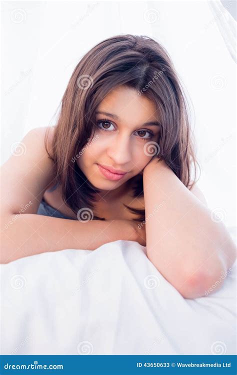 Beautiful Brunette Smiling At Camera On Bed Stock Image Image Of Camera Domicile 43650633