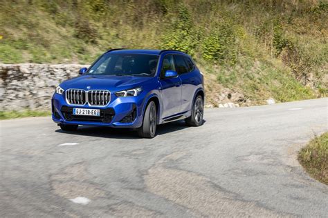 2023 Bmw X1 M Portimao Blue Poses For The Camera For France Premiere