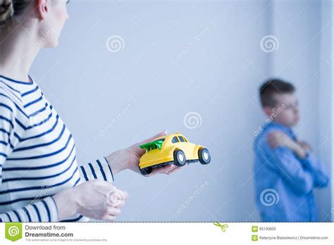 Mom Giving Toy Car To Her Son Stock Image Image Of Apathy