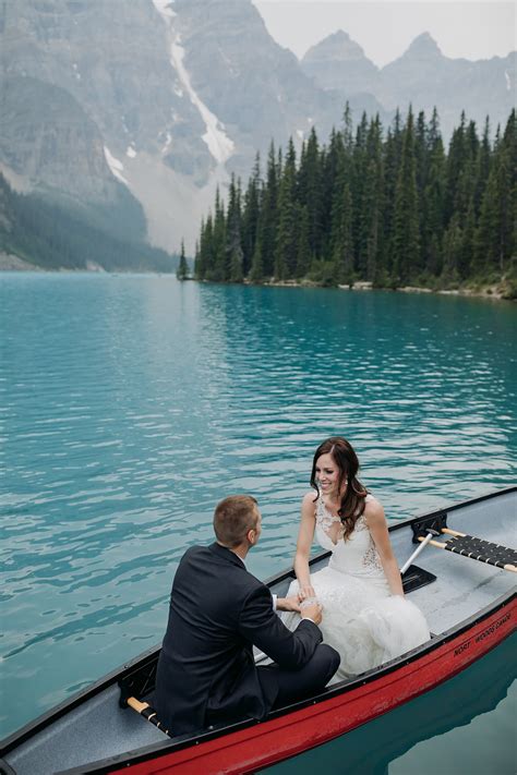 Moraine Lake Lodge Wedding Photos With Canoes And Mountain Views