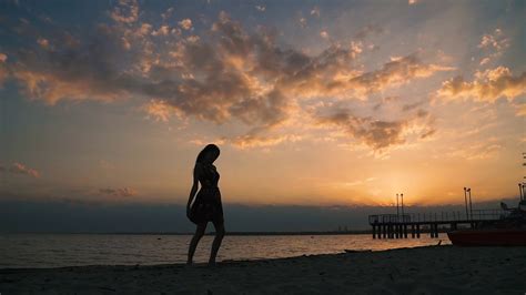 Silhouette Of Person In Light Dress On Beach Stock Footage Sbv 315274277 Storyblocks
