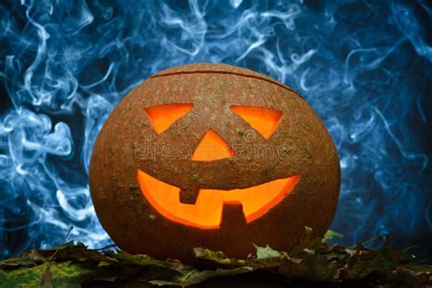 Glowing Halloween Pumpkin And Blue Smoke Stock Image Image Of