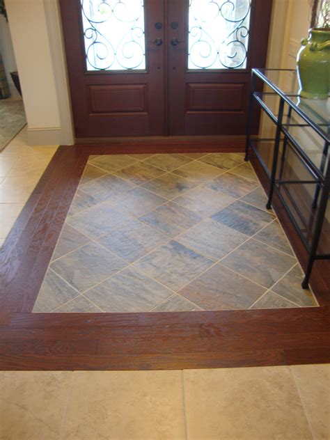 Tile Entryway With Wood Floor