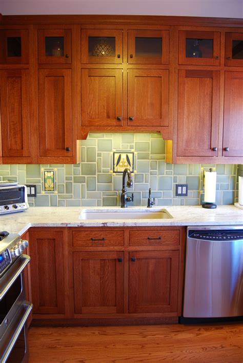 Quartersawn oak cabinets are shown to advantage in this evocative kitchen that calls for texture. 2-Tier Inset Quarter Sawn Oak Kitchen | Custom kitchen ...