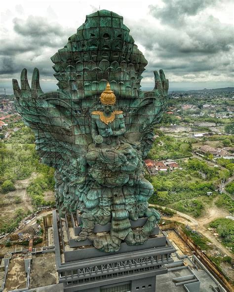 An Aerial View Of A Giant Statue In The Shape Of A Human Head And Hands