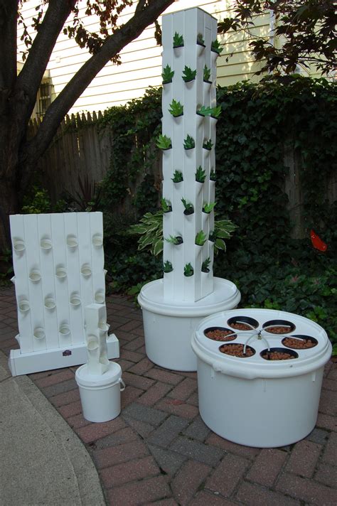 I own 4 tower gardens and we love them!! Garden Up | Tower garden, Diy greenhouse, Garden items