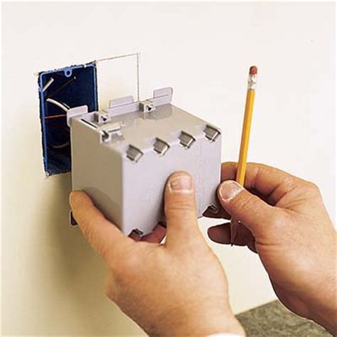 Use the included template to drill the holes through the cabinet, and then use the included screws to mount the power box to the underside of the cabinet. Trace outline of new electrical box | How to Install ...