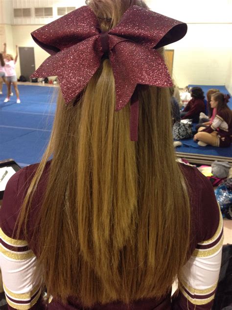 You need to comb the front strand back, use a lot of hairspray so that the poof stays long and fix it in a ponytail. Perfect cheer hair for non-humid football games! Straight ...