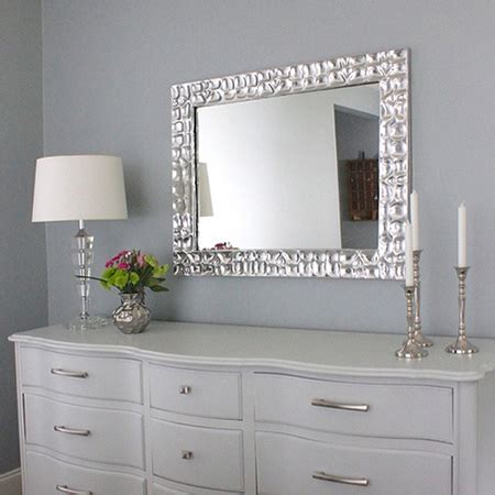 Can't get enough of the sparkly, glitzy, glamorous shine that is new year's eve? HOME DZINE Home Decor | Metallic silver designer mirror