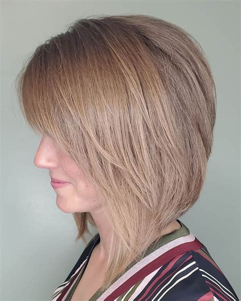 30 short angled bob with side swept bangs fashionblog